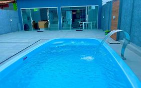 Casa com piscina e hidromassagem praia Enseada.